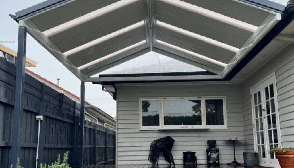 Pergola attached to a small backyard