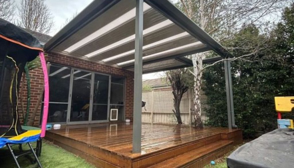 Pergola covering deck and trampoline area