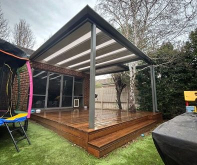 Pergola covering deck and trampoline area